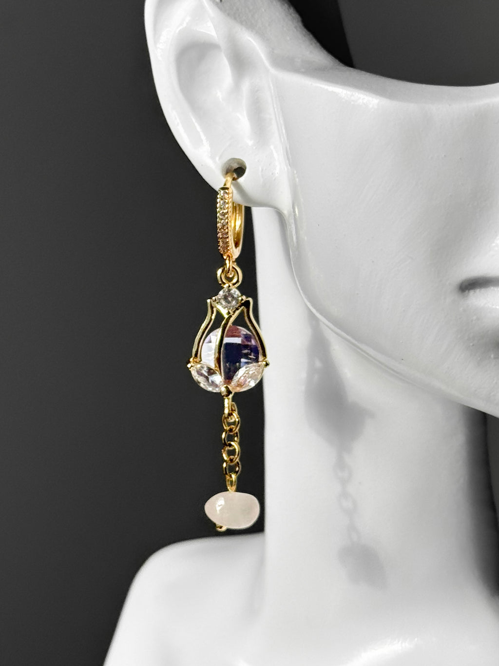 Gold earrings with gemstones