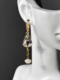 Gold earrings with gemstones